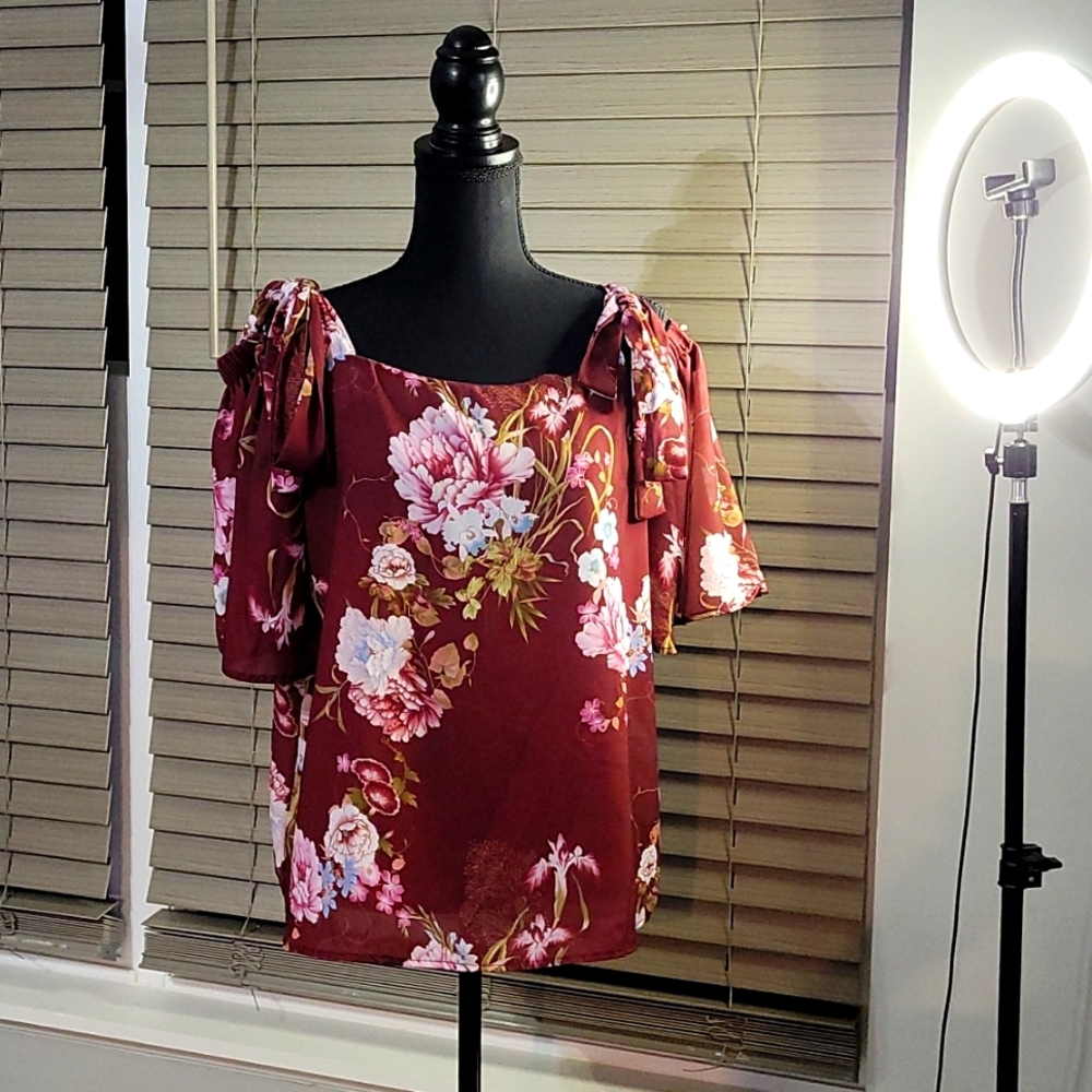 NWOT, Burgundy/floral tie straps,flutter off the shoulders blouse.